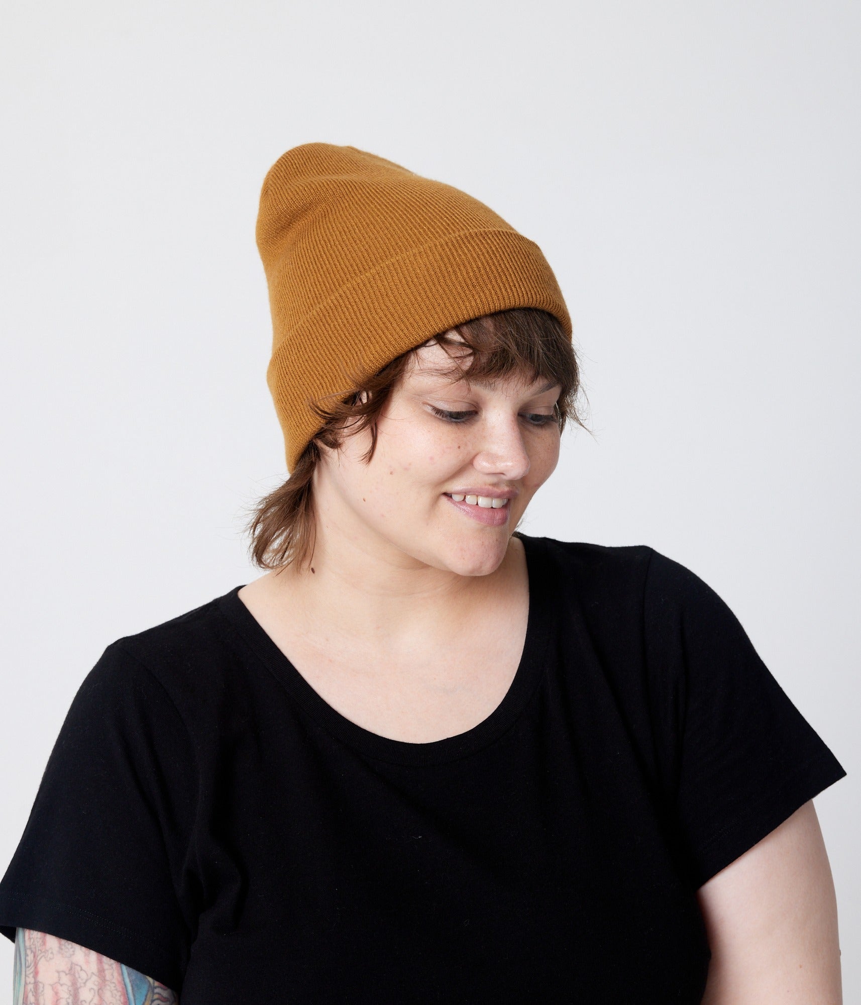 Turmeric beanie on model (side)