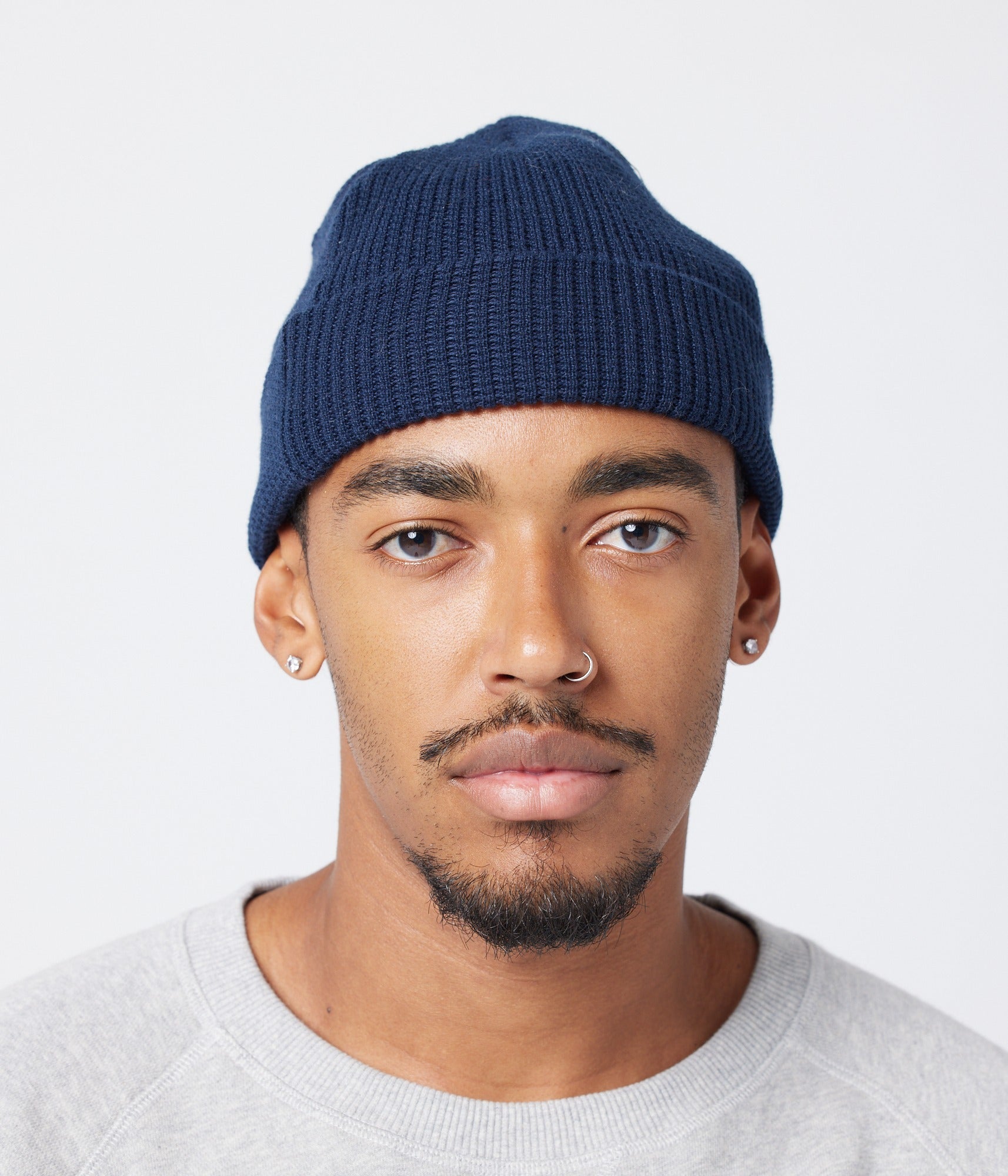 Navy beanie on model